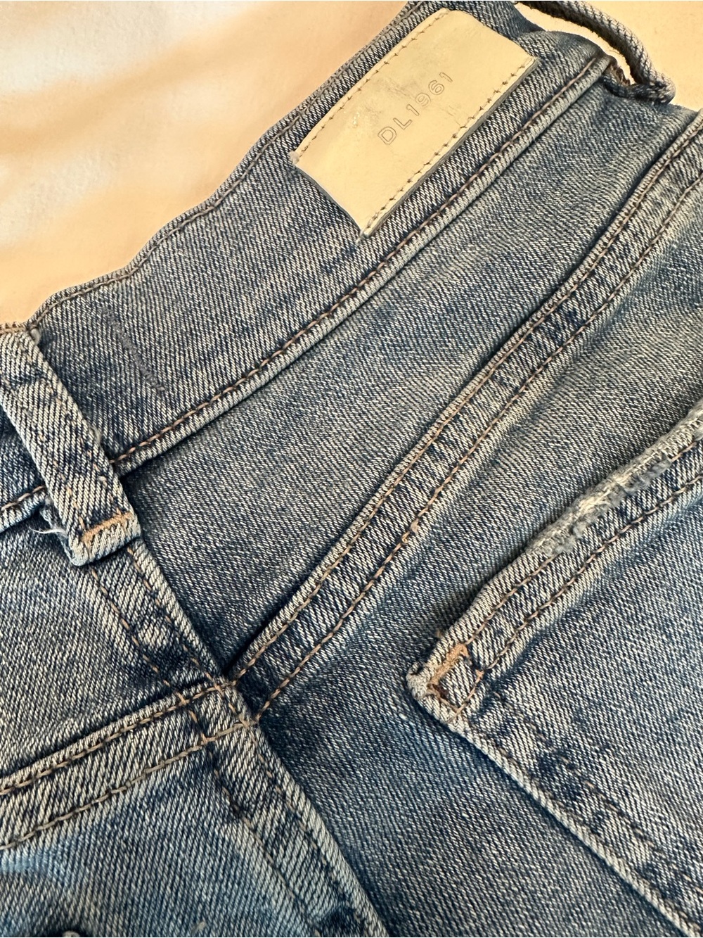 DL1961 High-Rise Jeans in Light Blue Denim